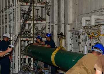 USS Frank Cable Conducts Weapons Handling Training with USS Springfield