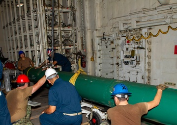 USS Frank Cable Conducts Weapons Handling Training with USS Springfield