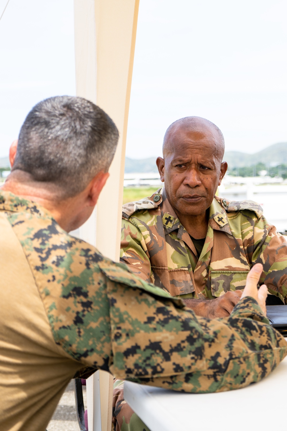 MRF-D 24.3: U.S. Navy Chaplain, RP, meets PNGDF religious leader during HADR