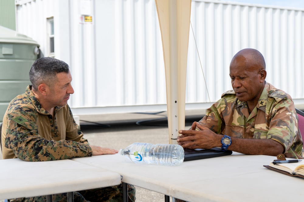 MRF-D 24.3: U.S. Navy Chaplain, RP, meets PNGDF religious leader during HADR