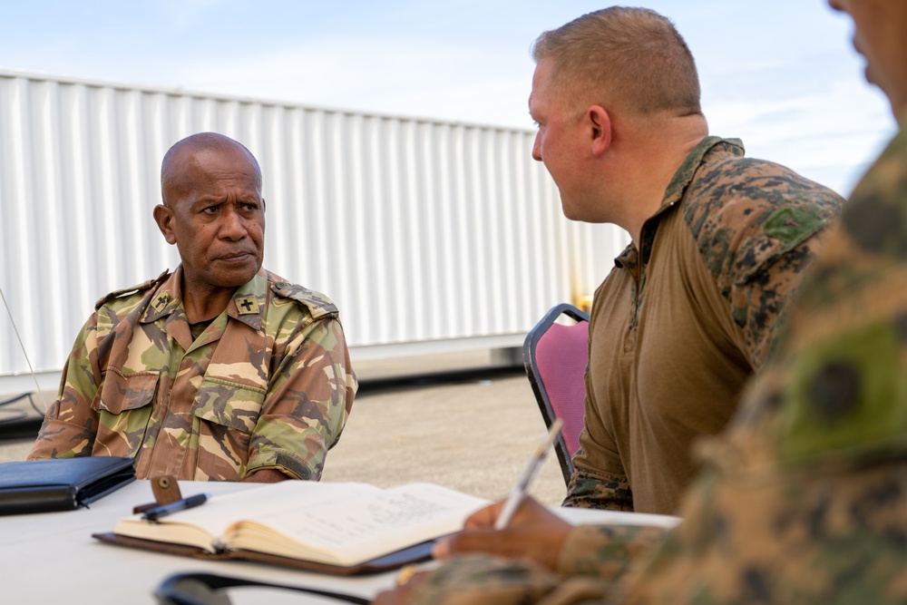 MRF-D 24.3: U.S. Navy Chaplain, RP, meets PNGDF religious leader during HADR