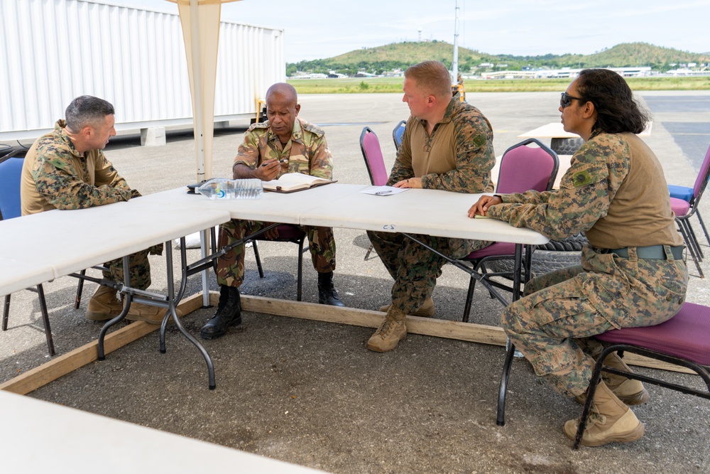 MRF-D 24.3: U.S. Navy Chaplain, RP, meets PNGDF religious leader during HADR