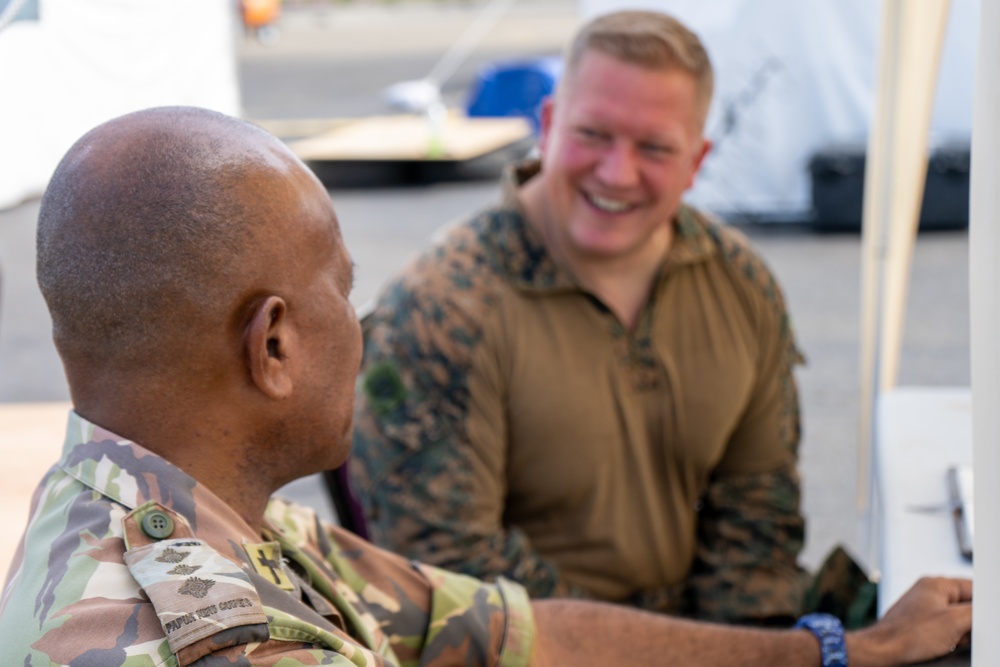 MRF-D 24.3: U.S. Navy Chaplain, RP, meets PNGDF religious leader during HADR