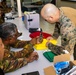 MRF-D 24.3: U.S. Navy, PNGDF medical personnel practice preventative medicine procedures