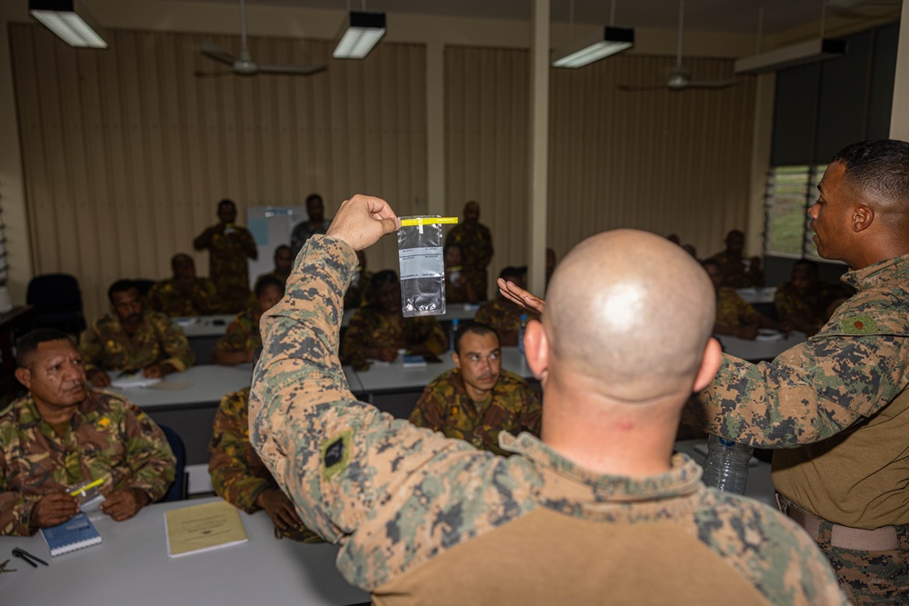 MRF-D 24.3: U.S. Navy, PNGDF medical personnel practice preventative medicine procedures