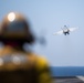 The &quot;Fighting Swordsmen&quot; of Strike Fighter Squadron (VFA) 32 Conduct an Airborne Change of Command Ceremony in the Red Sea