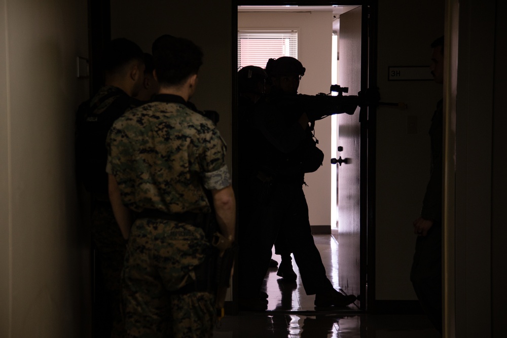 Training for Success! Working Dog Handlers and Special Reaction Team perform training at Marine Corps Air Station Iwakuni, Japan