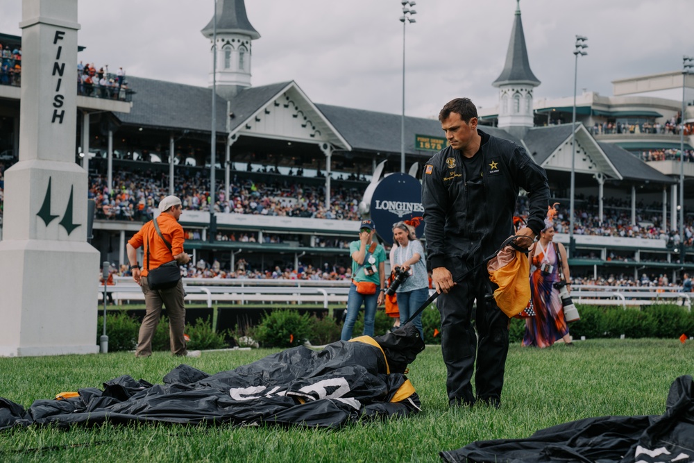 U.S. Army Parachute Team the Golden Knights' Demonstration Parachutist Land Side by Side on Kentucky Derby Finish Line