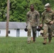 Delaware Army National Guard Soldier Carries Kettlebells