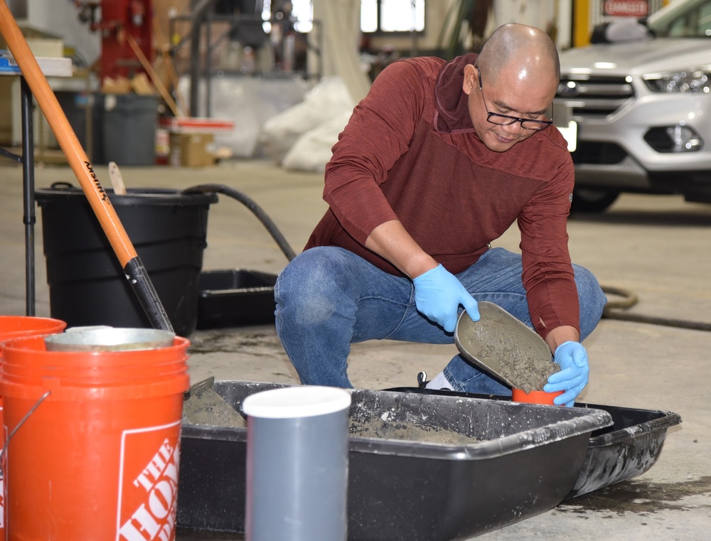 Glenn Sacro, construction control representative, participates in the ACI practical exam at the Alaska District