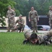 West Virginia Army National Guard Soldier participates in high-intensity interval training during 2024 Region II Best Warrior Competition - Burpee exercise