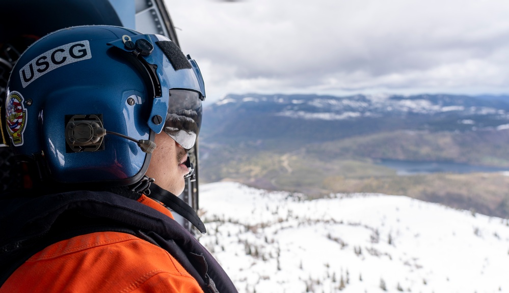 Coast Guard MH-60 Jayhawk helicopter aircrews from Air Station Astoria train above Mount St. Helens