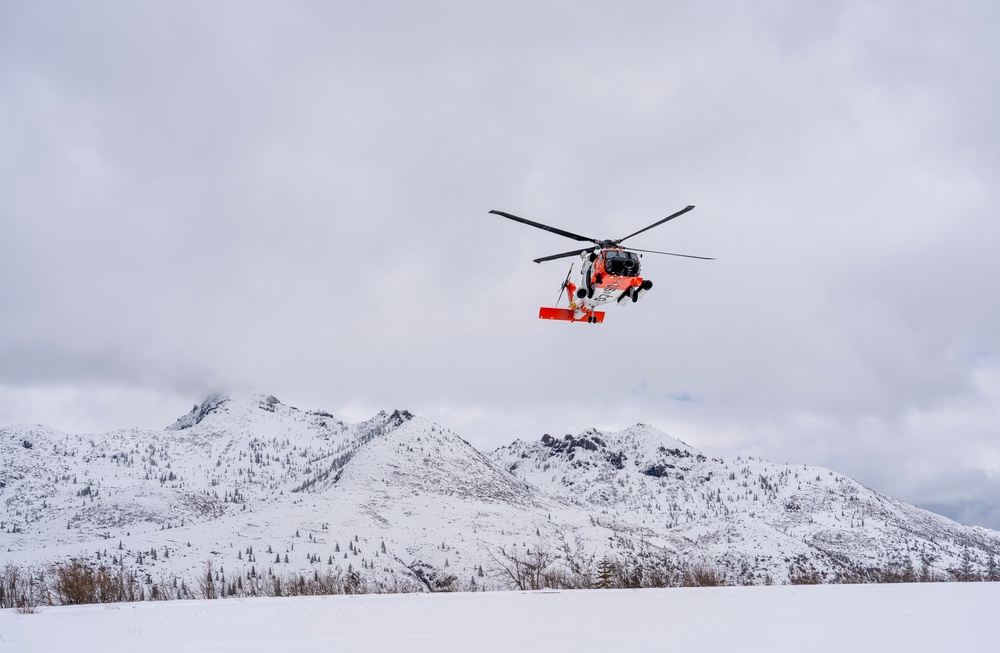 Coast Guard MH-60 Jayhawk helicopter aircrews from Air Station Astoria train above Mount St. Helens