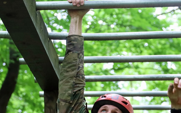 Maryland Army National Guard Soldier navigates obstacle course during Region 2 Best Warrior Competition 2024