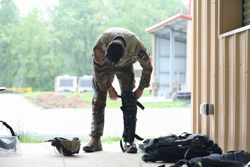 Soldier from Pennsylvania Army National Guard Dons Riot Gear Equipment