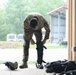 Soldier from Pennsylvania Army National Guard Dons Riot Gear Equipment