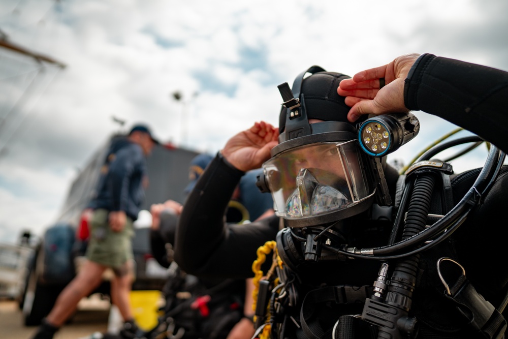 Divers inspect Coast Guard Cutter Eagle