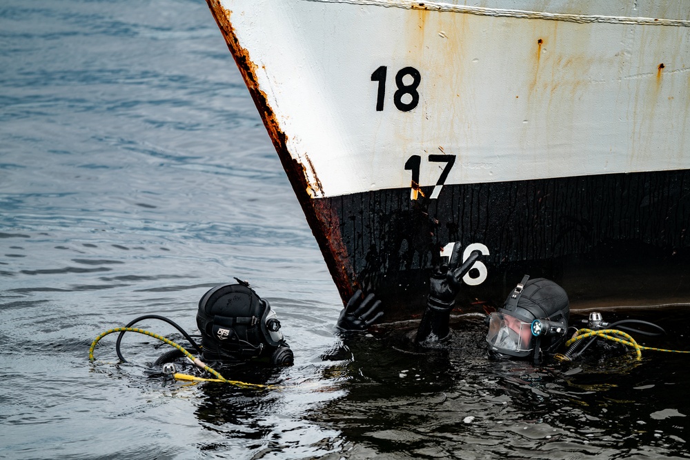 Divers inspect Coast Guard Cutter Eagle