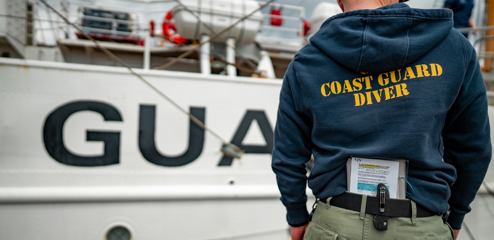 Divers inspect Coast Guard Cutter Eagle