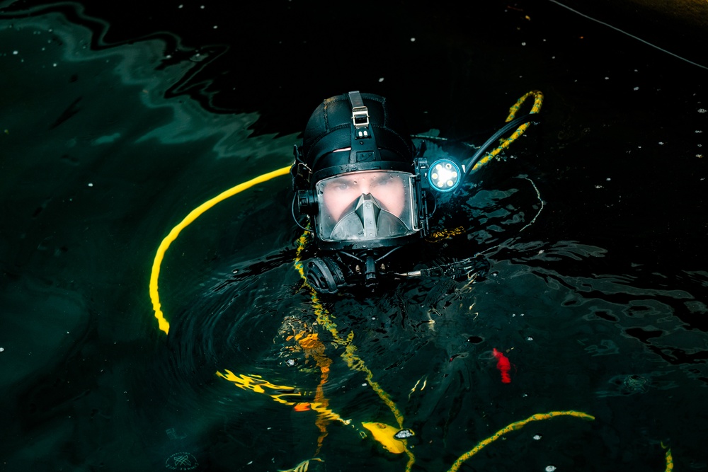 Divers inspect Coast Guard Cutter Eagle