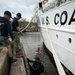 Divers inspect Coast Guard Cutter Eagle