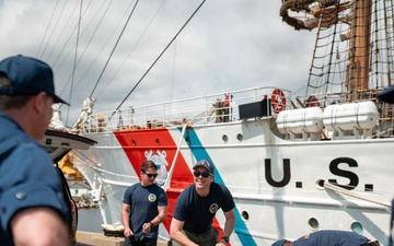 Divers inspect Coast Guard Cutter Eagle