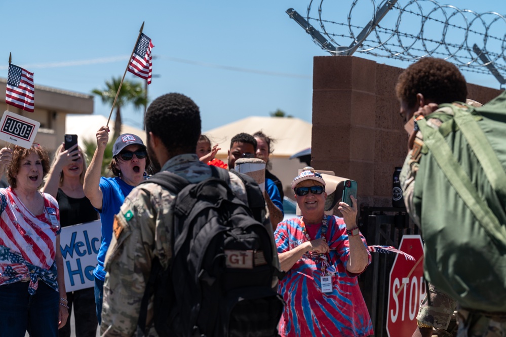 Airmen from the 99th Security Forces Squadron return home