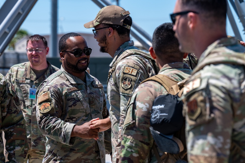 Airmen from the 99th Security Forces Squadron return home