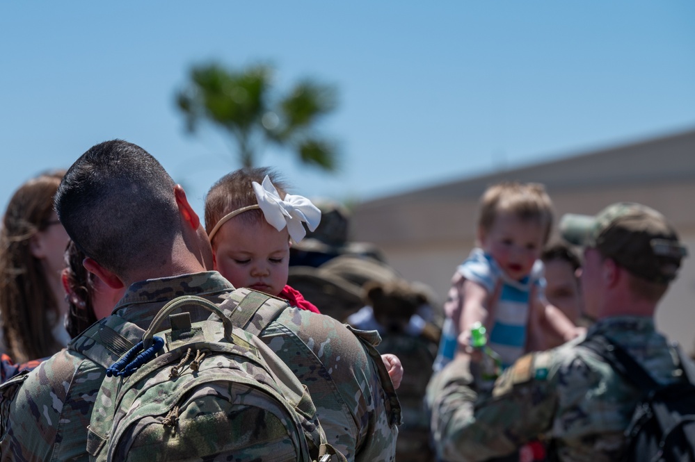 Airmen from the 99th Security Forces Squadron return home