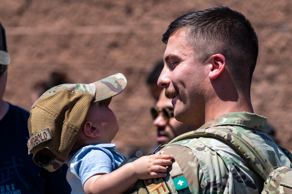 Airmen from the 99th Security Forces Squadron return home