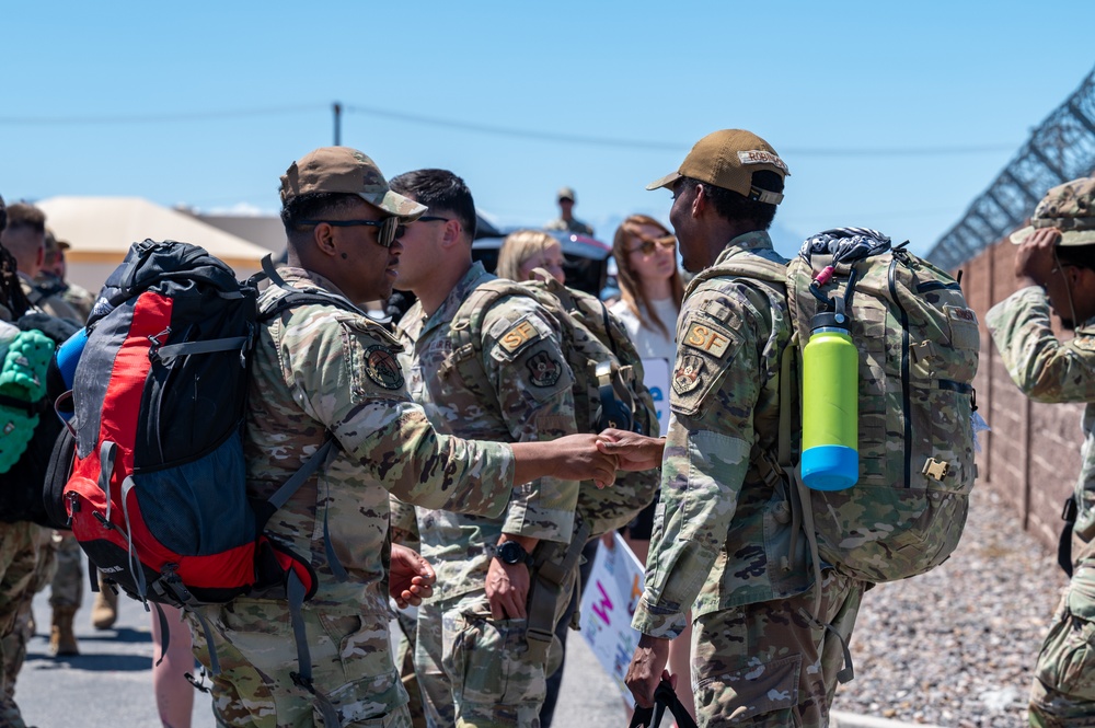 Airmen from the 99th Security Forces Squadron return home