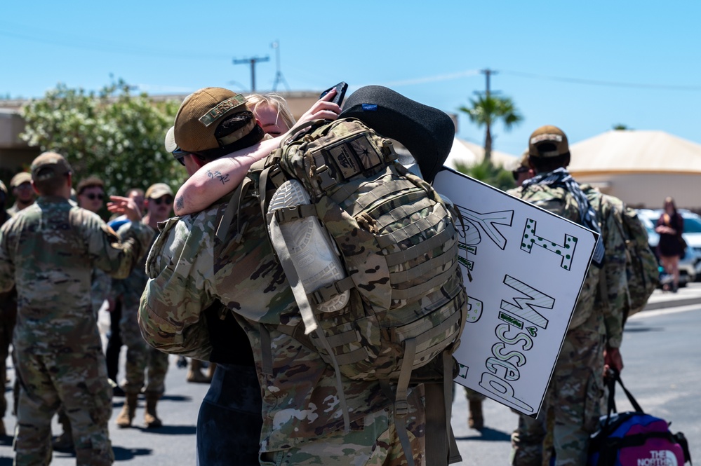 Airmen from the 99th Security Forces Squadron return home