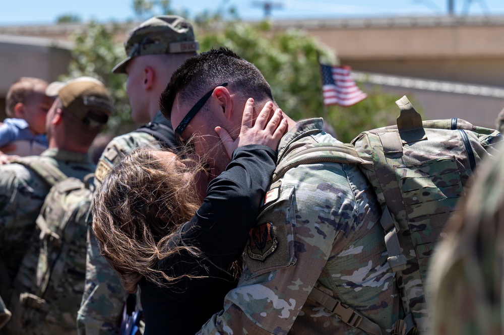 Airmen from the 99th Security Forces Squadron return home