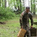 Pennsylvania Army National Guard Soldier Carries Ammo Boxes for Region Two Best Warrior Competition