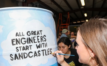 Real Estate Team Building 'Beautifies the Bucket' for beach cleanup