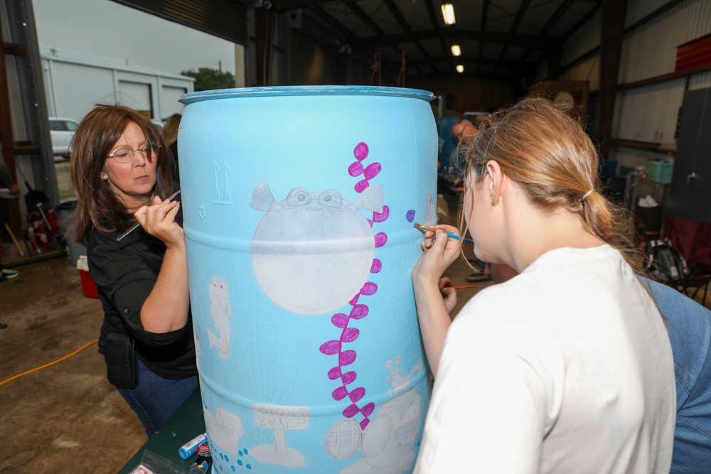 Real Estate Team Building 'Beautifies the Bucket' for beach cleanup