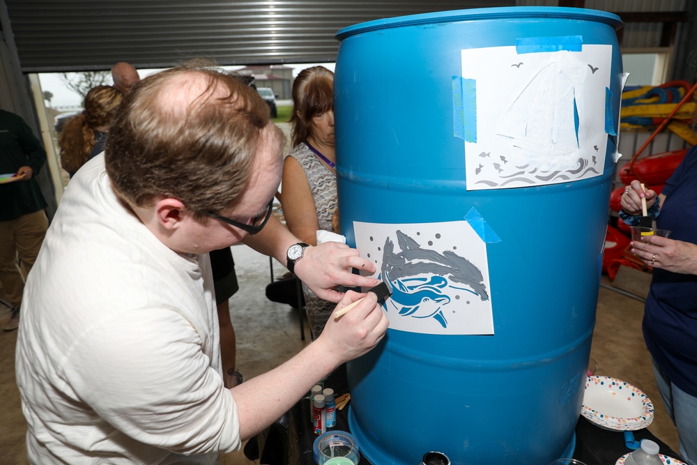 Real Estate Team Building 'Beautifies the Bucket' for beach cleanup