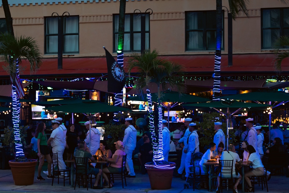 U.S. Navy Sailors walk along Ocean Drive during Fleet Week Miami 2024