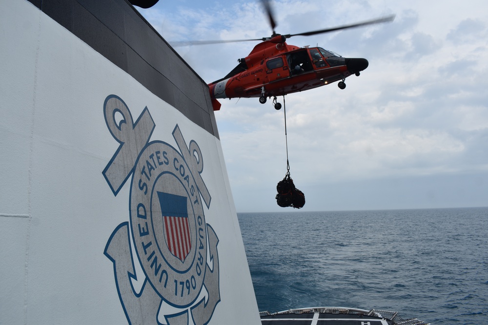 U.S. Coast Guard Cutter Resolute conducts vertical replenishment with Air Station Miami