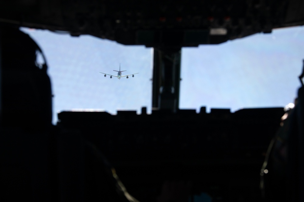 Alaska Air National Guardsmen practice in-flight refueling