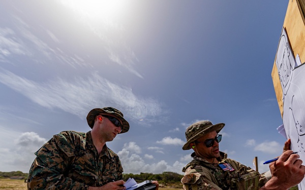 U.S. Marines and Coast Guard Maritime Interdiction Team East conduct pistol range at TRADEWINDS 24