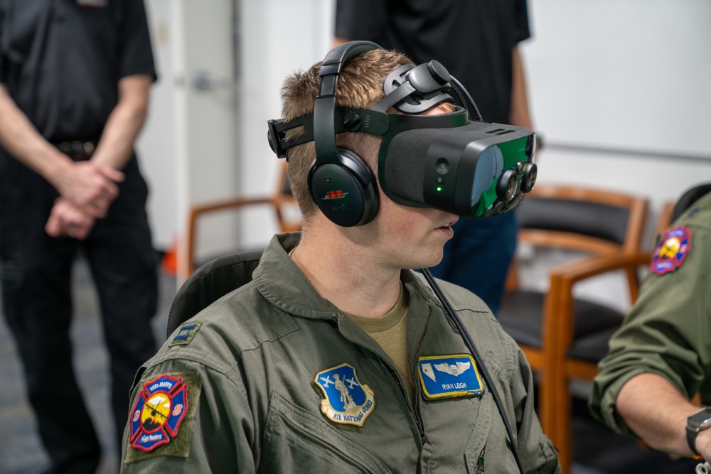 Capt. Ryan Leigh, a Nevada Air National Guard pilot practices aerial wildland firefighting on the simulator at Channel Islands Air National Guard Station, Port Hueneme, Calif.