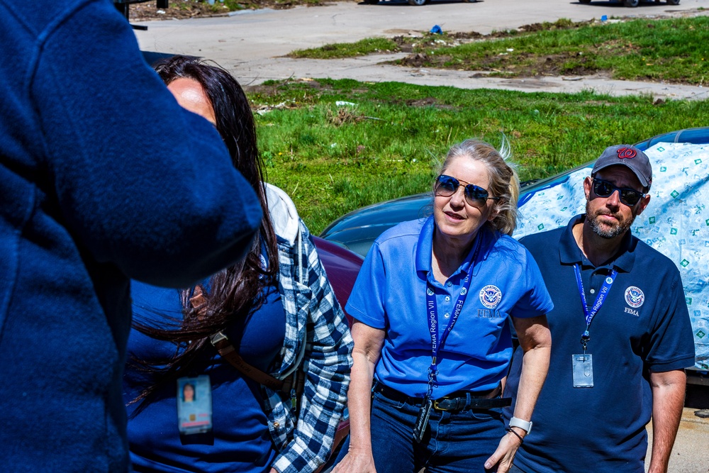 FEMA Officials Talks with a Disaster Survivor
