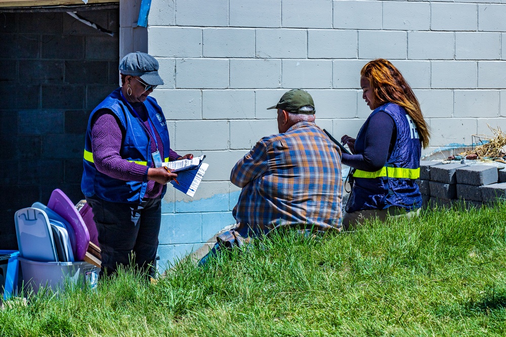 Disaster Survivor Assistance Team talks to a Survivor