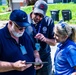 FEMA Officials Talks with a  FEMA Home Inspector