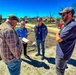 FEMA Officials Talks with a Disaster Survivor