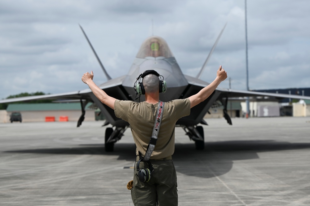 Crew Chief Marshals F-22 at Sentry Savannah 2024