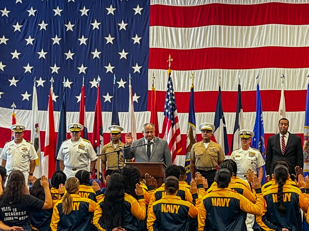 Secretary of the Navy Carlos Del Toro swears in future U.S. Navy Sailors and Marines during an Oath of Enlistment ceremony during Fleet Week Miami 2024