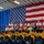 Secretary of the Navy Carlos Del Toro, center, and future U.S. Sailors and Marines recites the oath of enlistment during Fleet Week Miami 2024