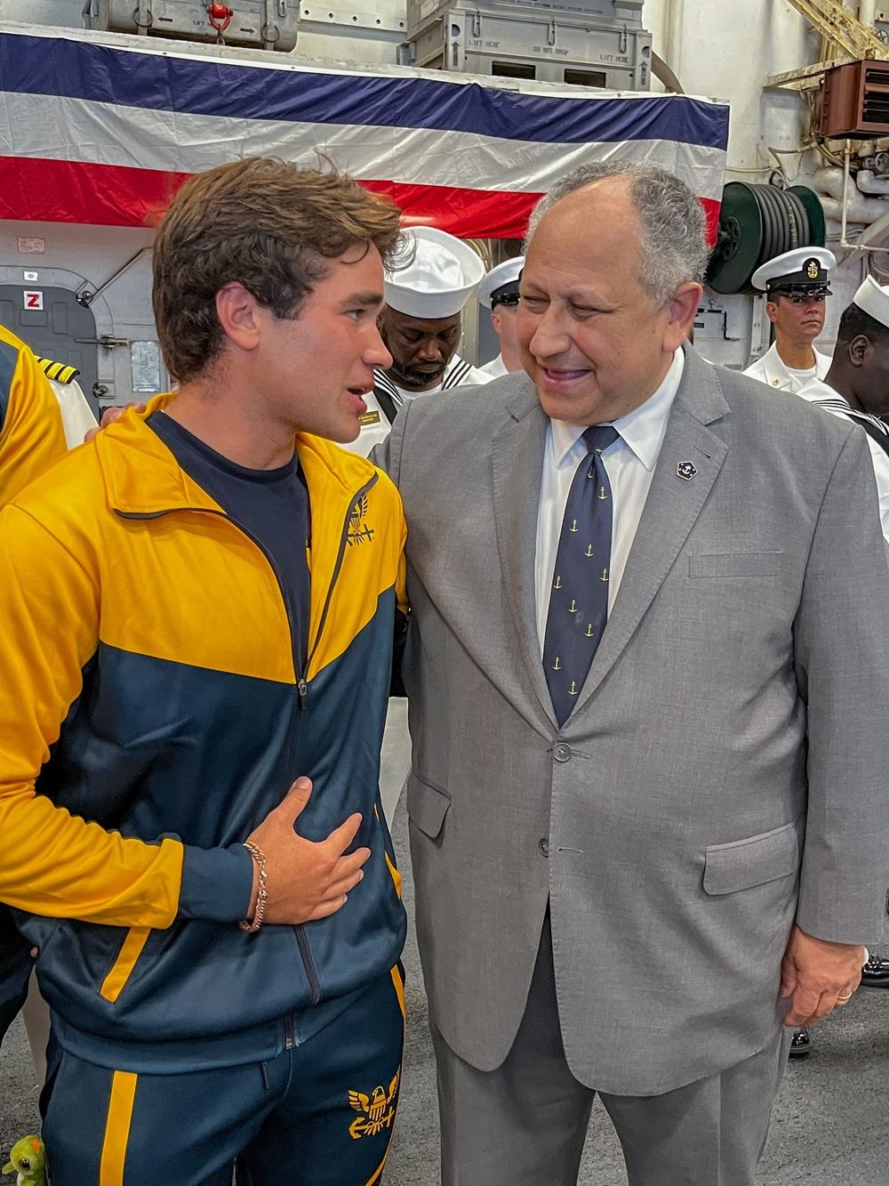 Secretary of the Navy Carlos Del Toro speaks with a future U.S. Navy Sailor after an Oath of Enlistment ceremony Fleet Week Miami 2024